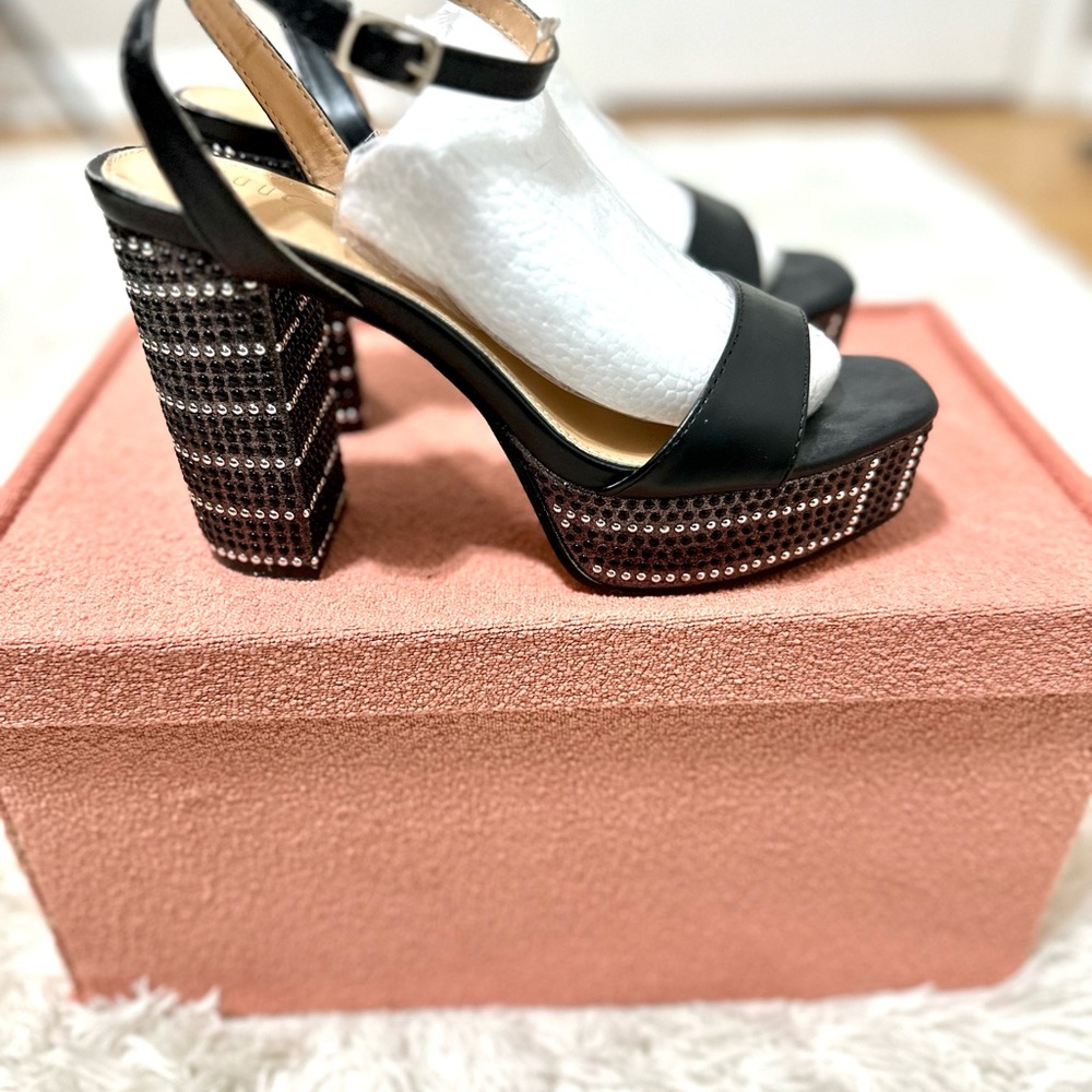 This is a pair Black platform block heel Sandals with Rhinestones sandals